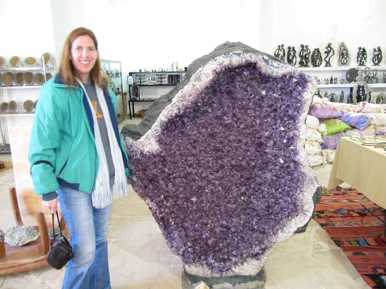 Betsy next to a large geode